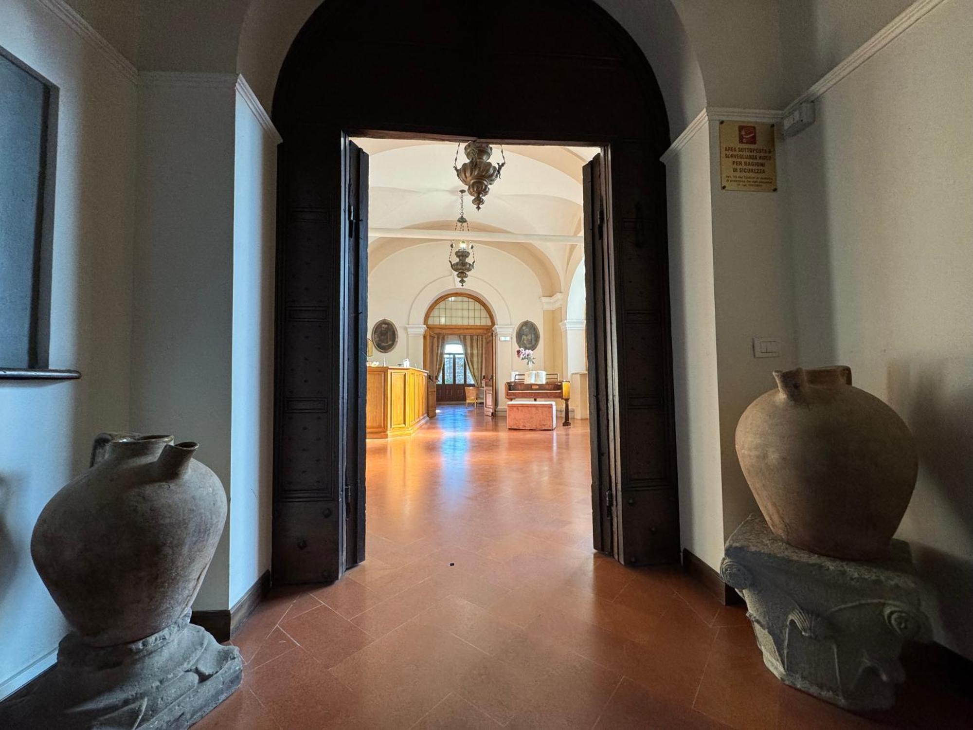 Hotel Monastero SS. Annunziata Todi Esterno foto Entrance to the museum