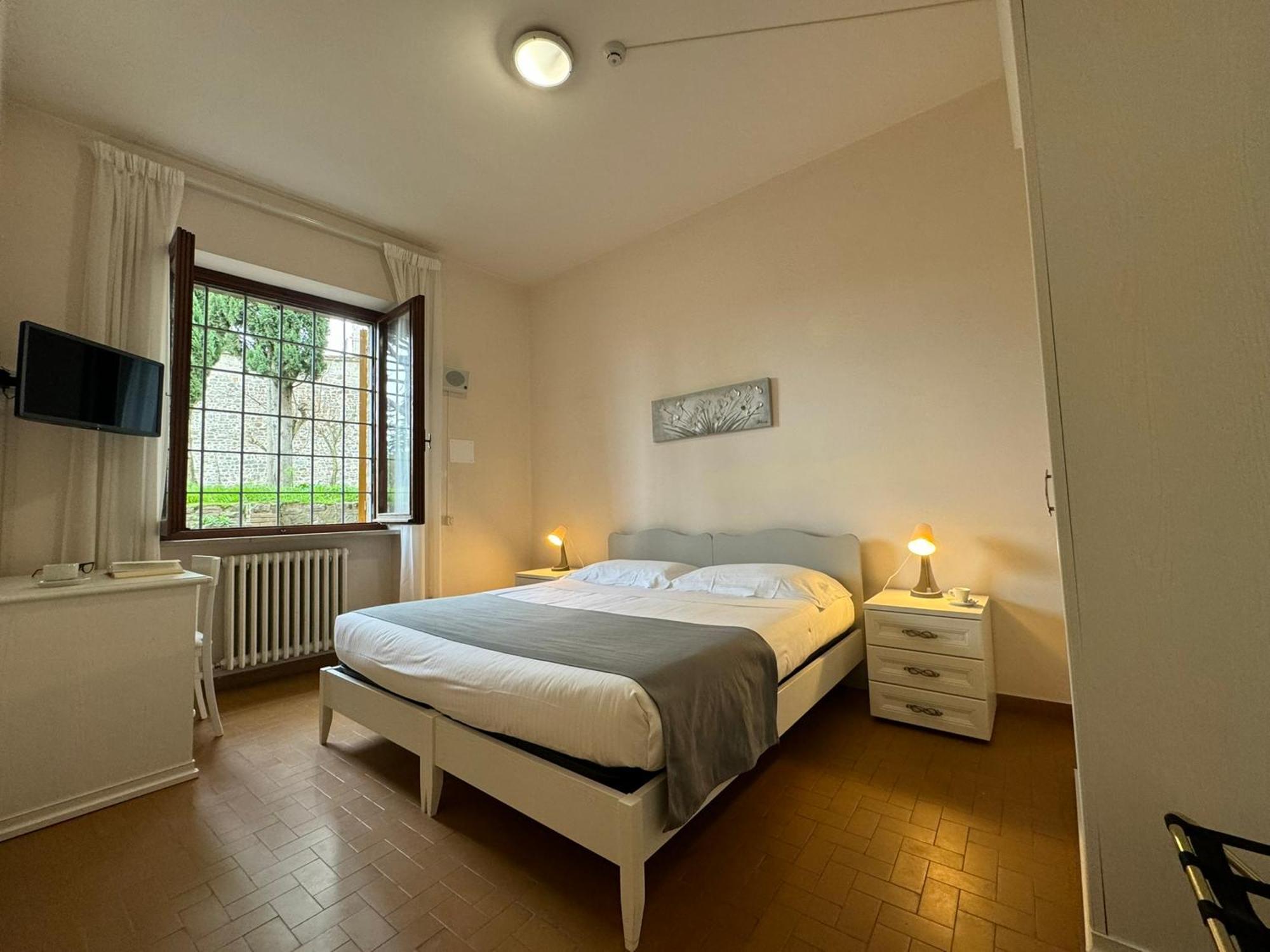 Hotel Monastero SS. Annunziata Todi Esterno foto A room at the hotel