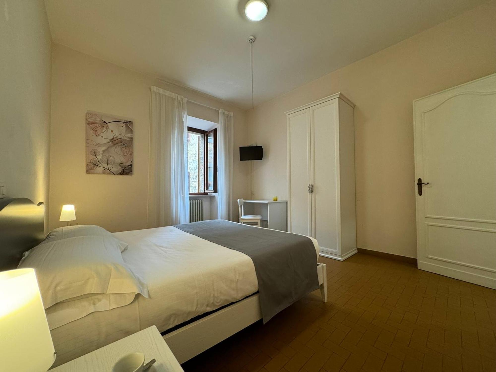 Hotel Monastero SS. Annunziata Todi Esterno foto A room at the hotel
