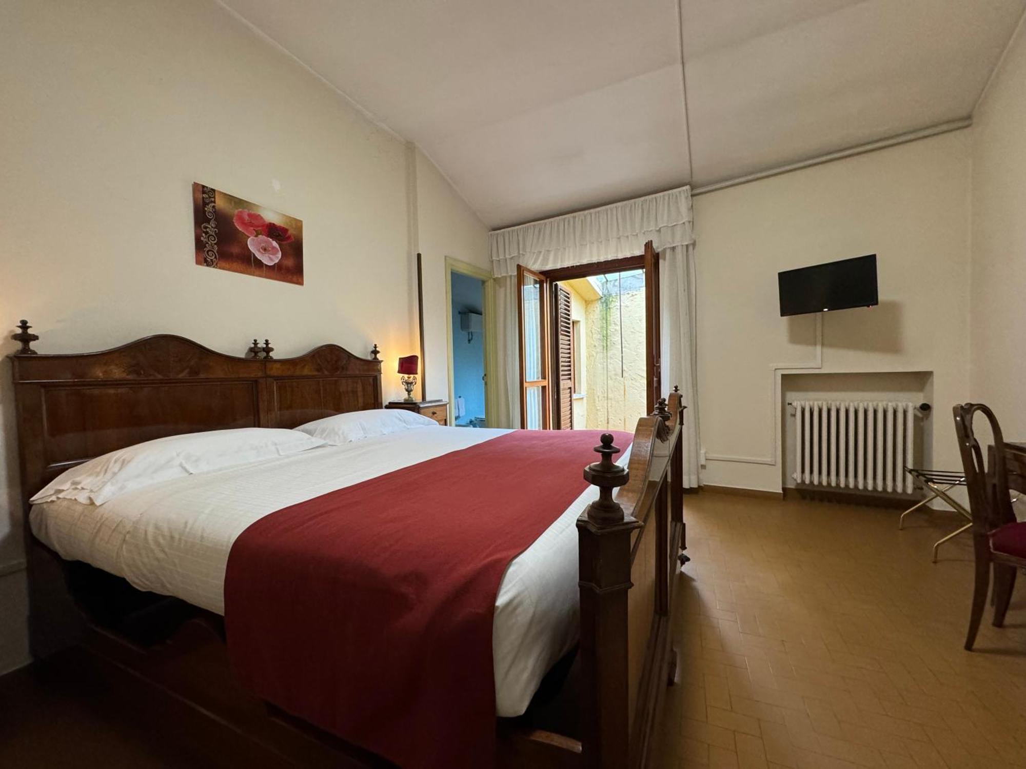 Hotel Monastero SS. Annunziata Todi Esterno foto A room at the hotel