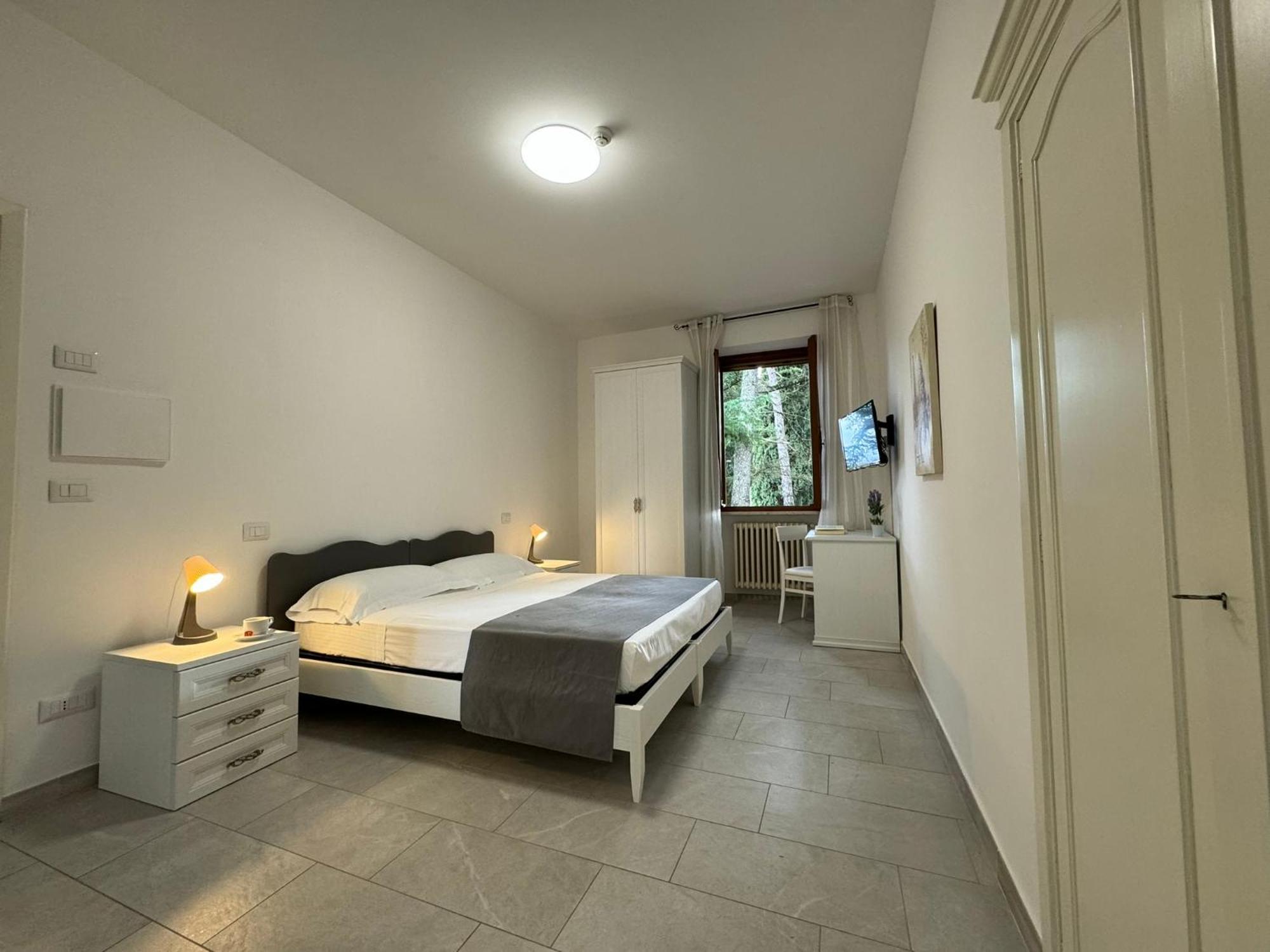 Hotel Monastero SS. Annunziata Todi Esterno foto A room at the hotel