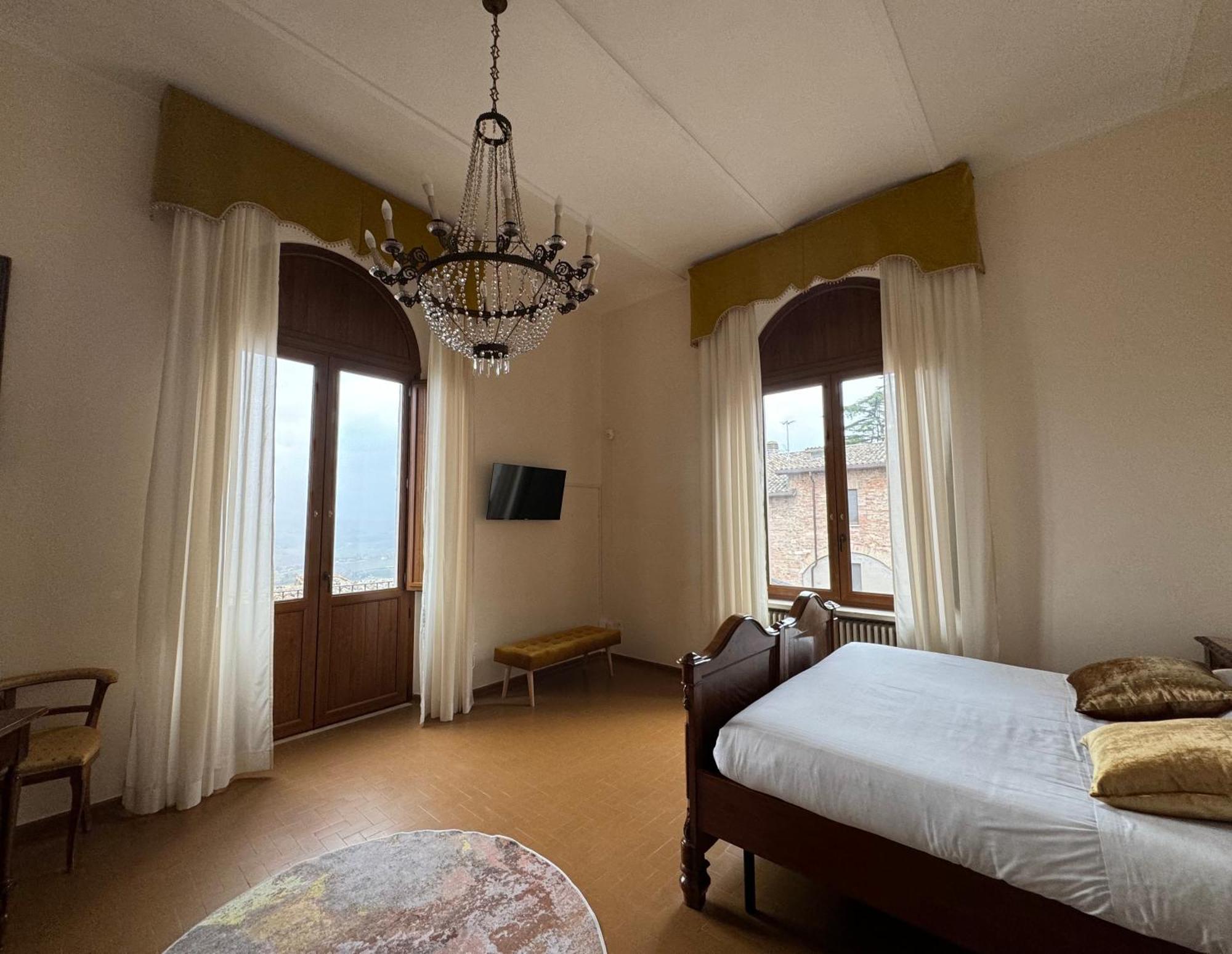 Hotel Monastero SS. Annunziata Todi Esterno foto A room at the hotel