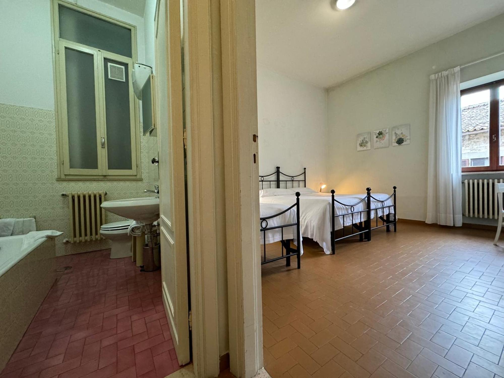 Hotel Monastero SS. Annunziata Todi Camera foto A typical room at the San Pio X Seminary