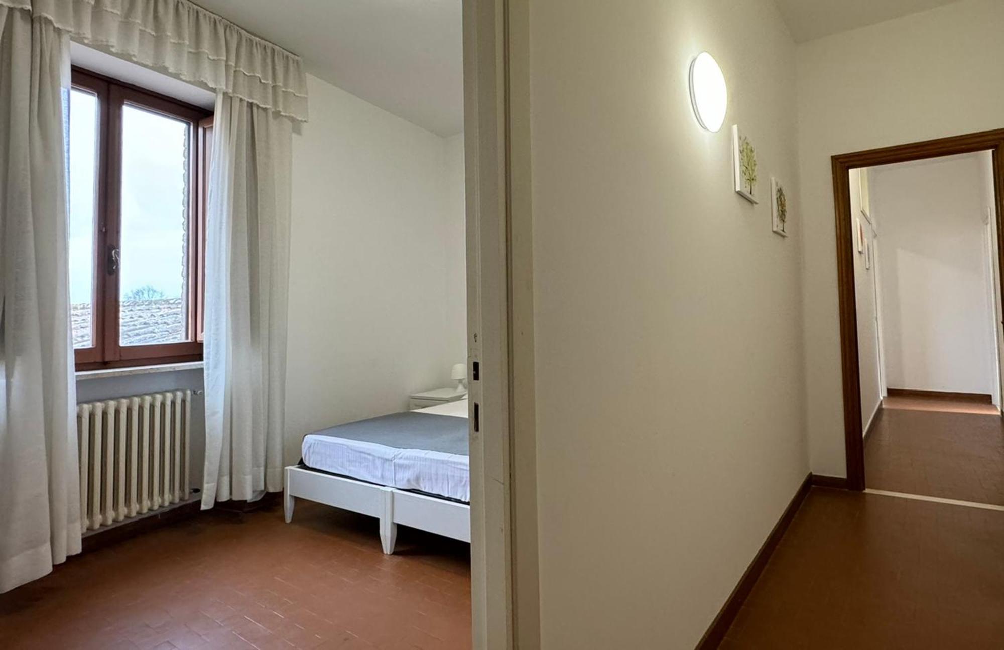 Hotel Monastero SS. Annunziata Todi Esterno foto A typical bedroom in the residence halls