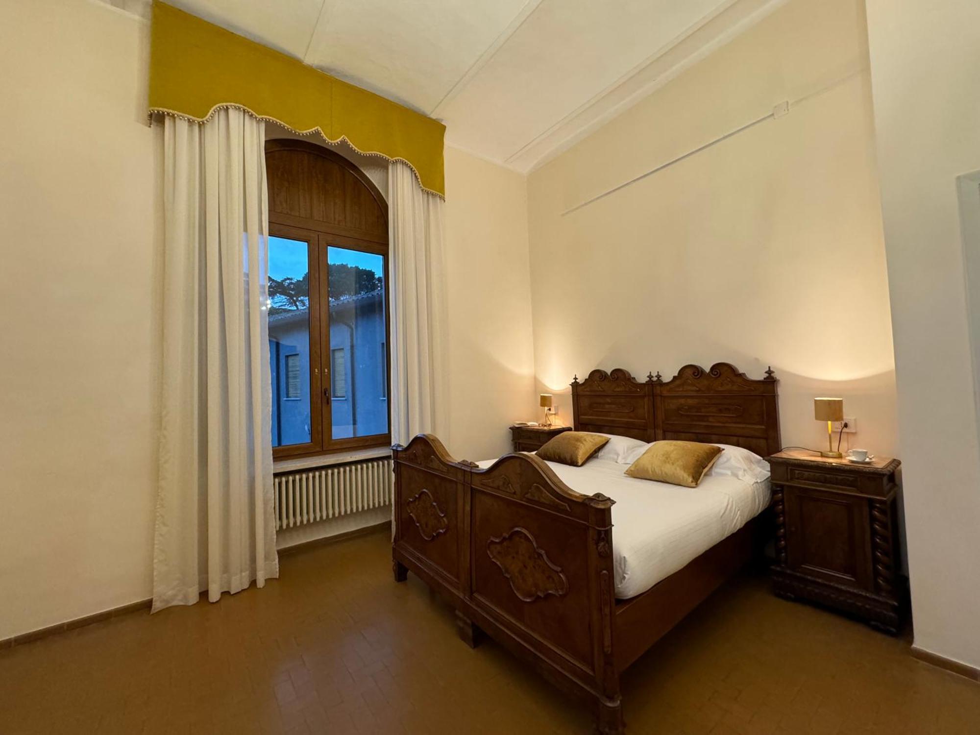 Hotel Monastero SS. Annunziata Todi Esterno foto A room at the hotel